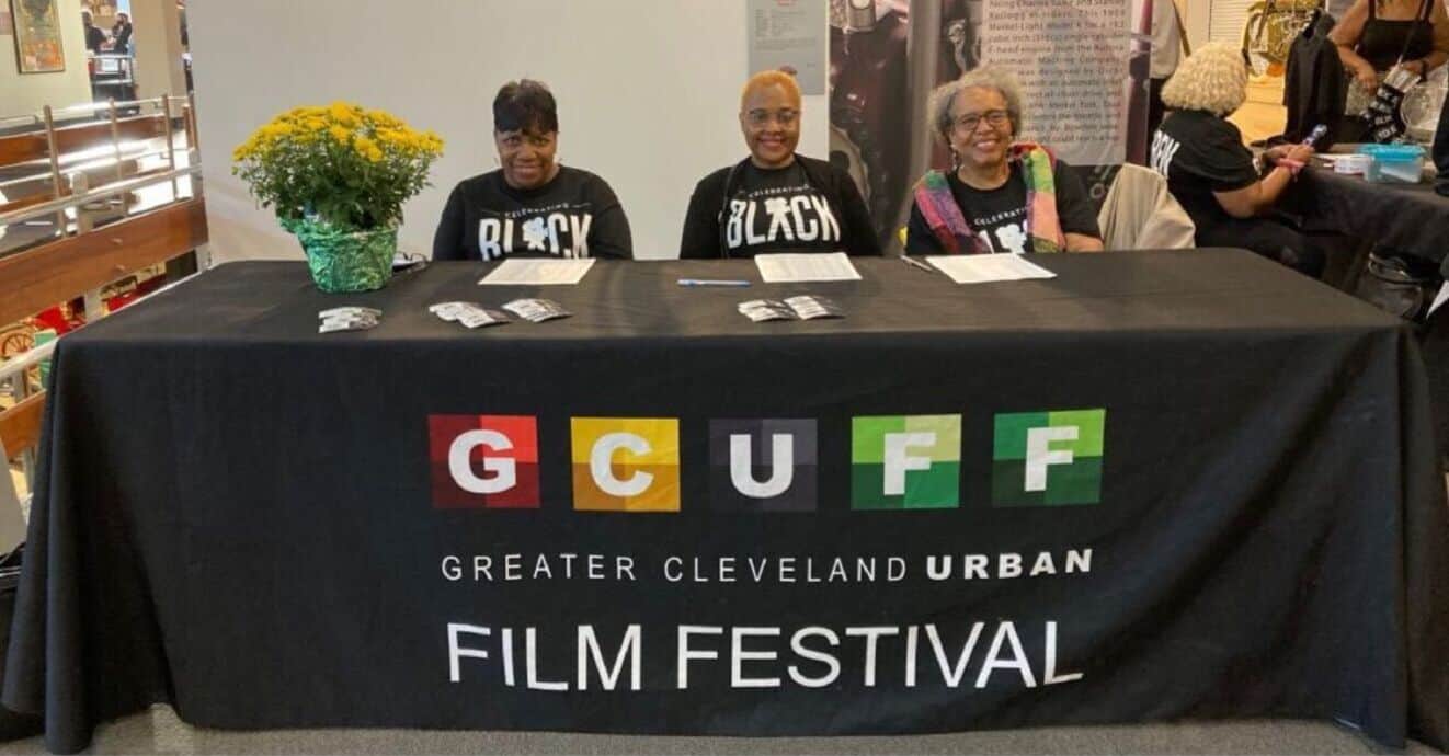 Gcuff closing night registration table cropped 1000x522